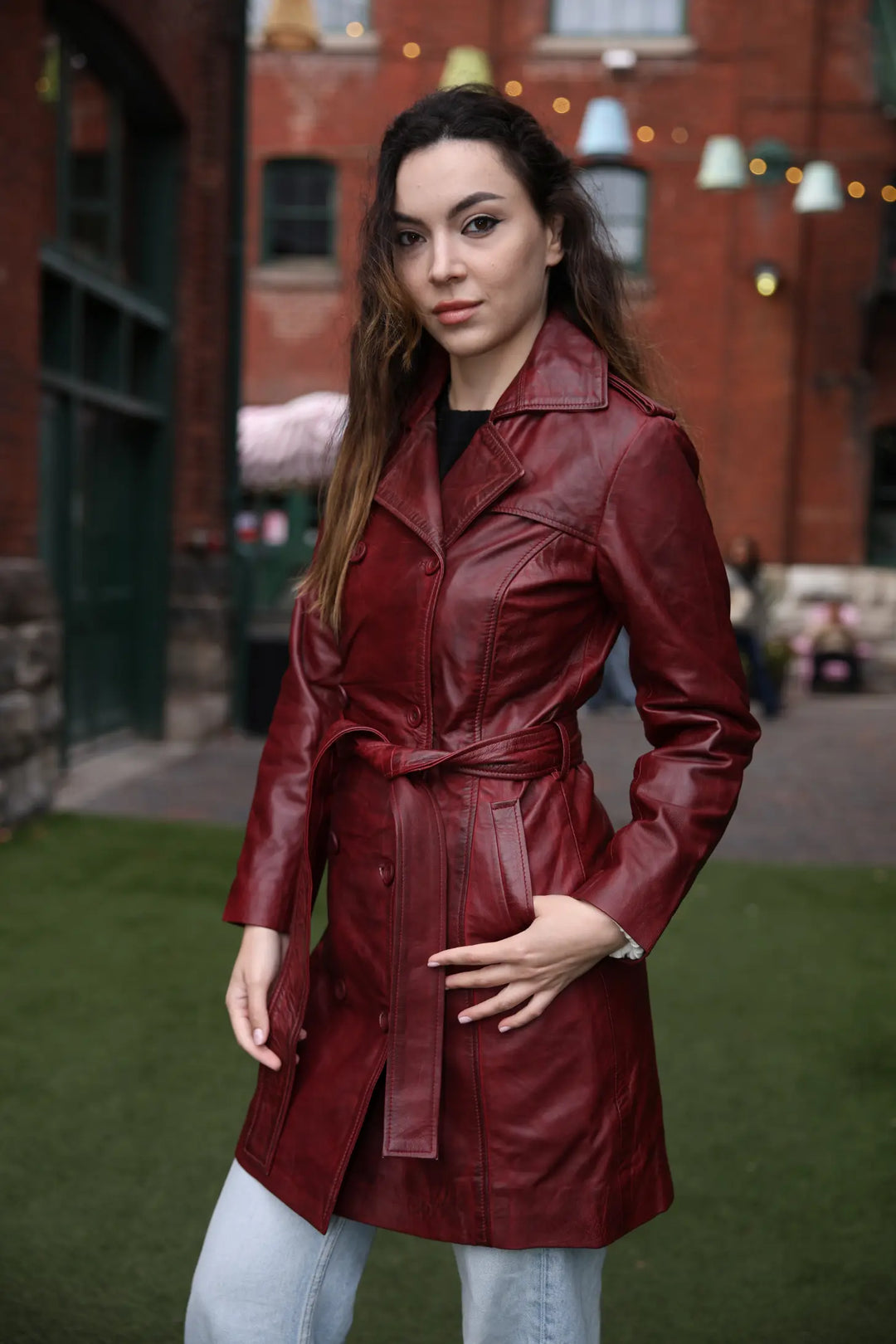 Coral red belted leather coat