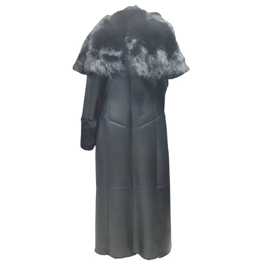 Back view of the Aria oversized leather sheepskin coat, showcasing the relaxed fit and premium long-line silhouette for winter layering.