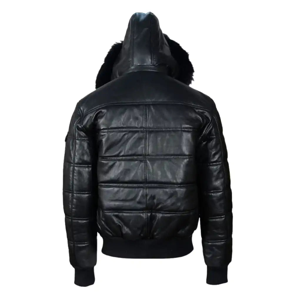 Back view of the Ash leather puffer showing the wide horizontal quilted baffles and the clean hang of the leather-clad hood.