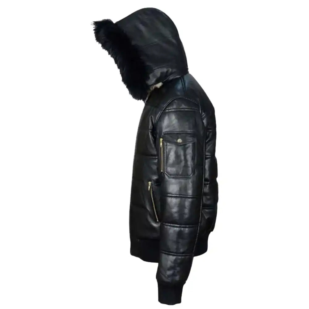 Side view of the Ash leather puffer showing the wide horizontal quilted baffles and the clean hang of the leather-clad hood.