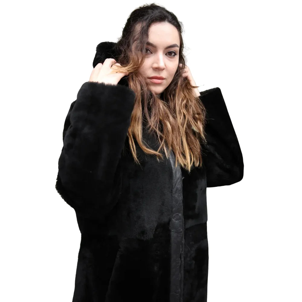 Close-up of the Avalon Black oversized reversible sheepskin long coat, featuring high-quality stitching, and a plush collar.