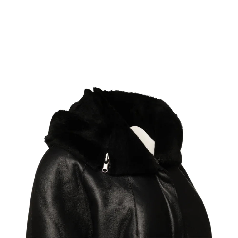 Upper side Close-up of the Avalon Black oversized reversible sheepskin long coat, featuring high-quality stitching, a plush collar