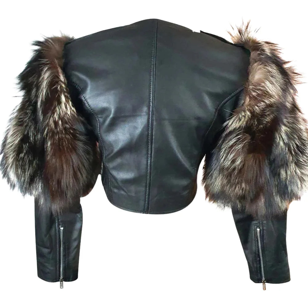 Back view of a tailored cropped leather jacket showing the belted waist and luxury fox fur sleeve detailing.