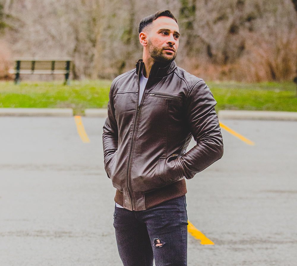 Brown leather jacket with straight ribbed collar, cuffs and hem