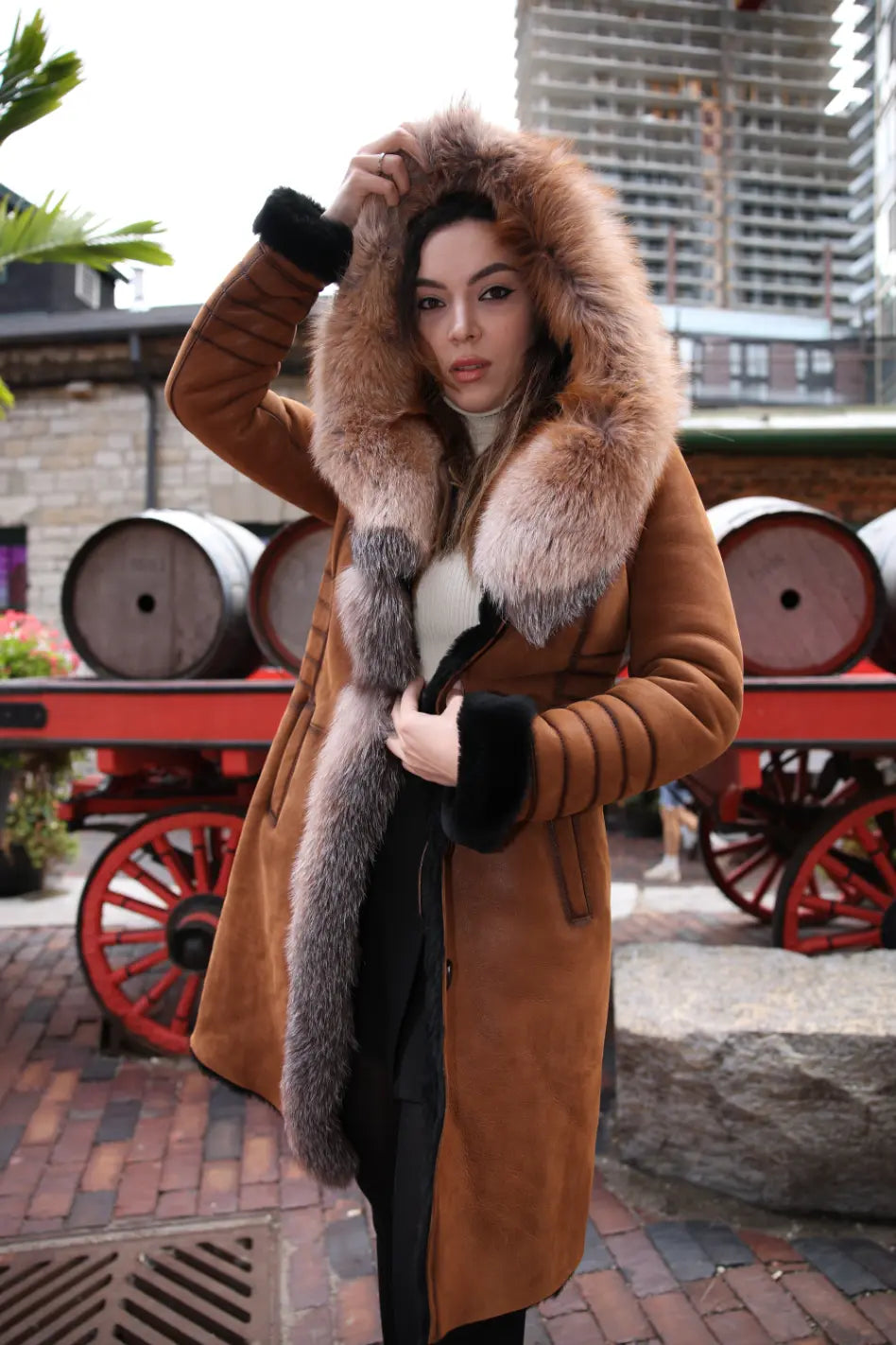 Chantal's Tan Shearling coat with large fox fur hoodie and trim