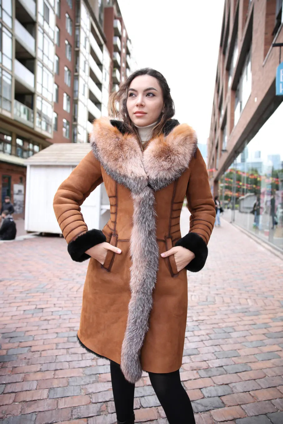 Chantal's Tan Shearling coat with large fox fur hoodie and trim