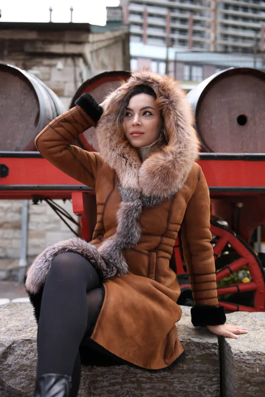 Chantal's Tan Shearling coat with large fox fur hoodie and trim