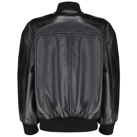 Back view of the Mabel oversized leather bomber showing the gathered elastic waistband and voluminous "balloon" sleeves.