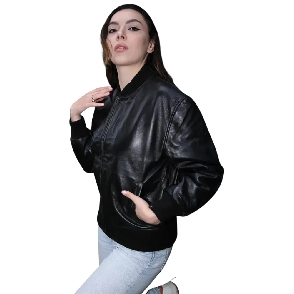 Model Side view of the Mabel leather bomber jacket illustrating the puffed sleeve silhouette and soft matte finish of the leather.