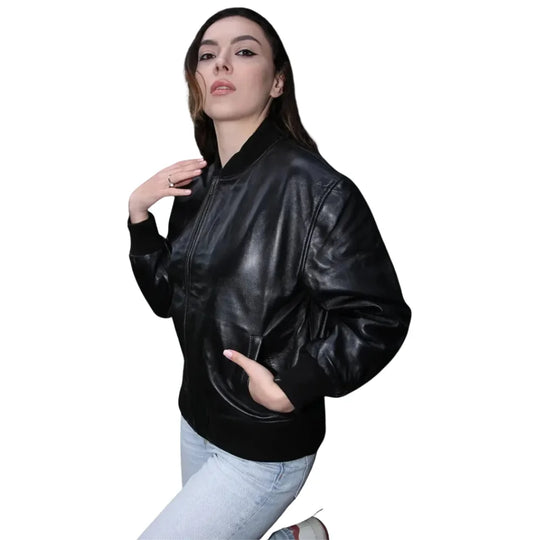 Model Side view of the Mabel leather bomber jacket illustrating the puffed sleeve silhouette and soft matte finish of the leather.
