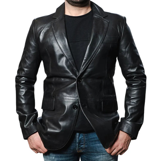 Close-up of the high-quality stitching and button details on the oversized black leather blazer, emphasizing craftsmanship.