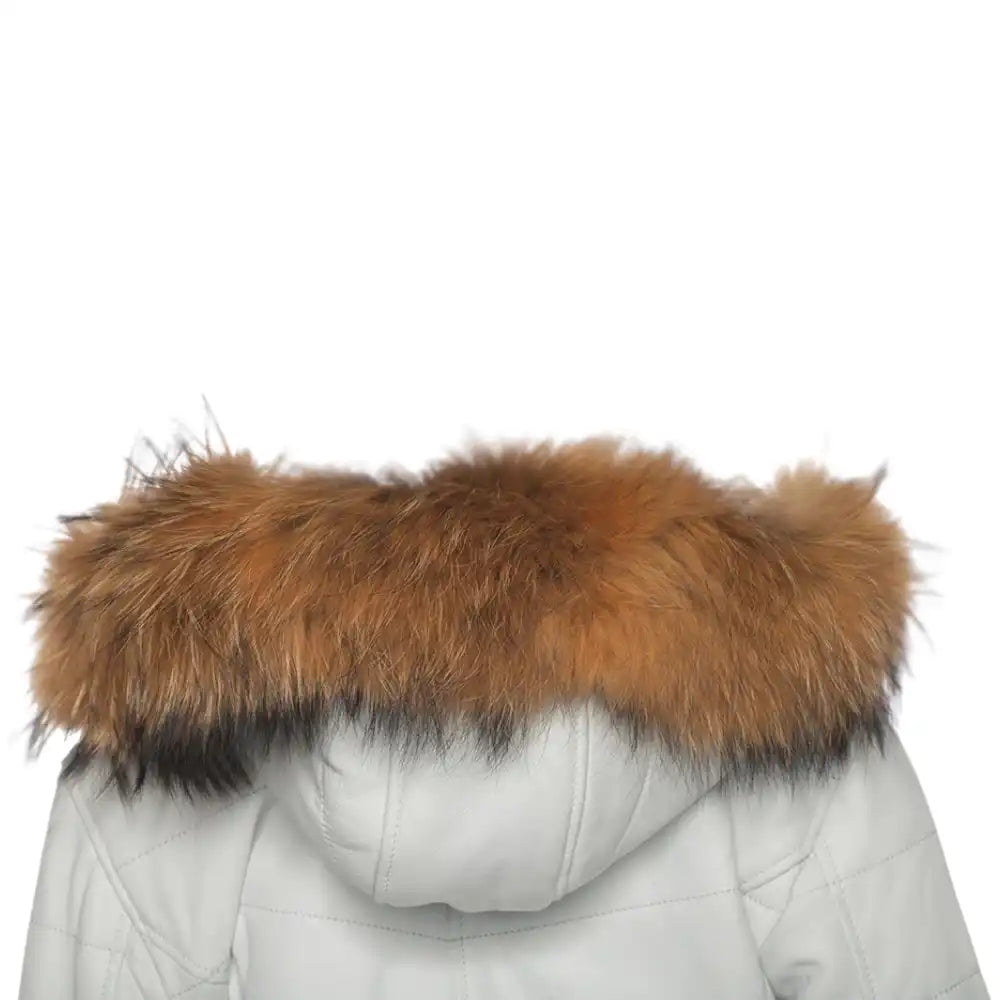 Fur Hood Close-up of the Snowy White leather, highlighting the reflective golden metallic coating and the fine grain of the premium leather.
