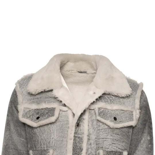 Close-up of Aiden's Grey Leather Jacket showcasing the luxurious faux fur collar. The grey leather is distressed, with a soft, fluffy white fur collar adding warmth and style to the jacket’s design.