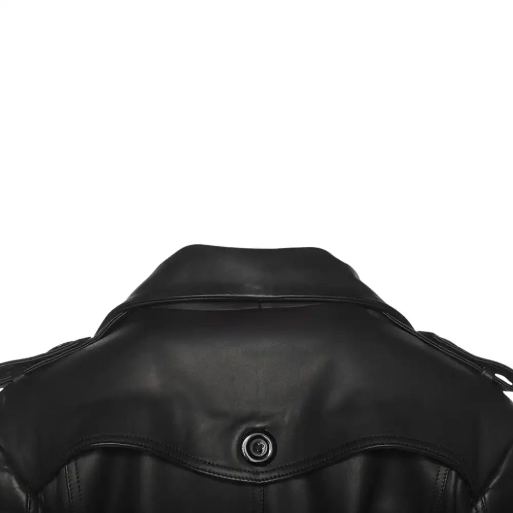 Close-up of back of a black leather trench coat showcasing a button styled closure on collar on a white background