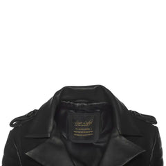 Detailed shot of collar of Black leather trench coat with a brand label on a white background