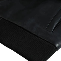 Black Bomber Style Ribbed Jacket front leather texture detail with ribbed waistband