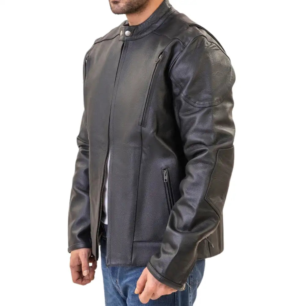 A model leaning against a modern classic motorcycle, wearing the Carson jacket to demonstrate its sharp, versatile silhouette.