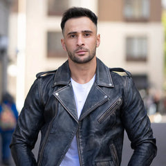 Model wearing the distressed belted leather biker jacket, styled with casual clothing for a bold, biker-inspired appearance.