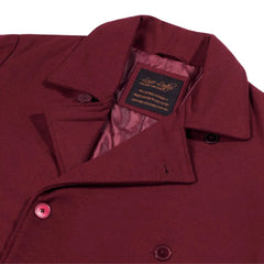 Close-up of the notch lapels and structured shoulder of the Dorian Burgundy Wool Overcoat, white background.