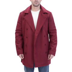 Man wearing a burgundy wool overcoat with open buttons on a white background