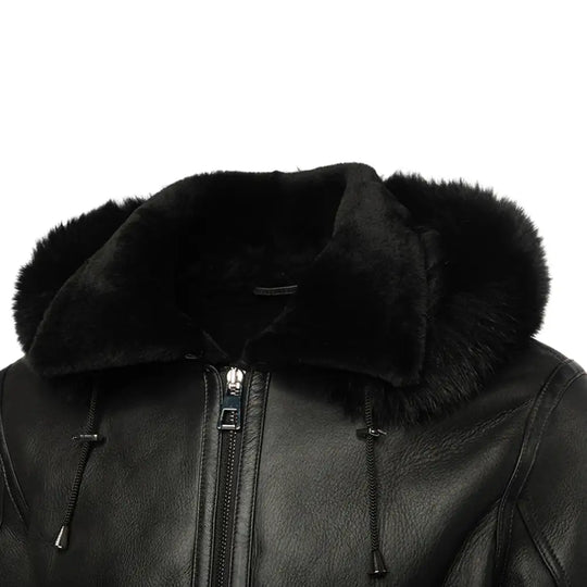 Close-up of the jacket’s collar, featuring a fur-lined detail that wraps around the neck, adding both style and warmth to the bomber jacket.