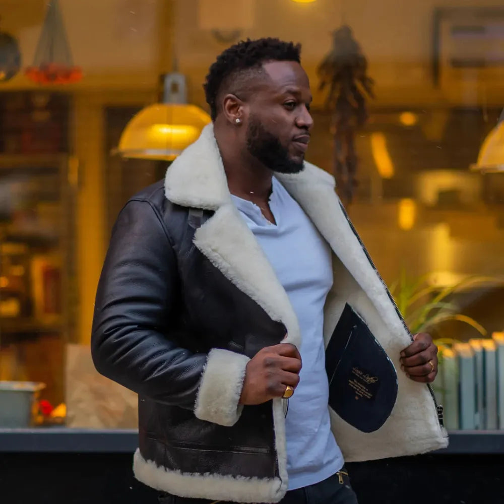 Model side view wearing Hampton's Classic Brown B 3 Bomber Aviator Shearling Jacket with Collar Belt