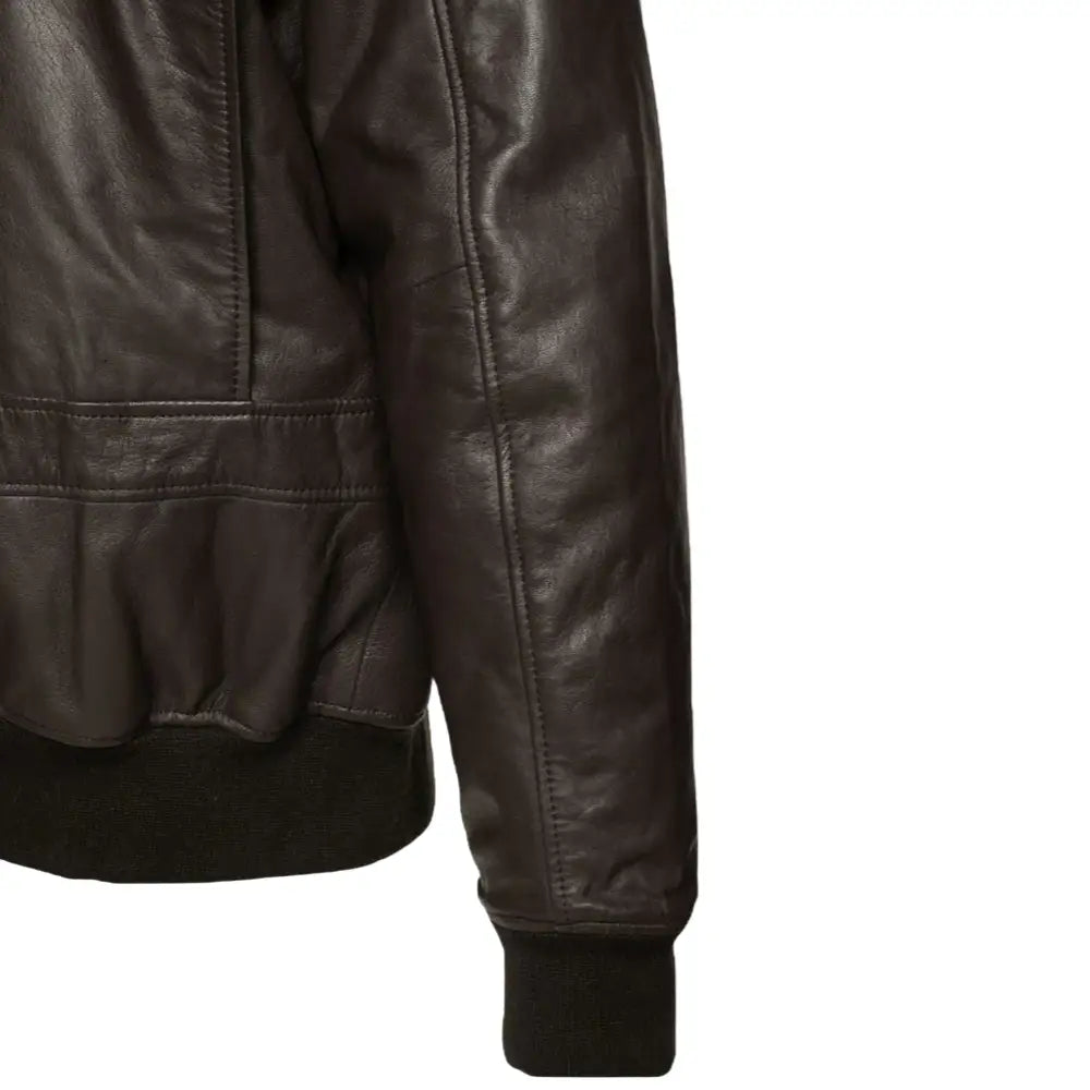 Close-up of the ribbed knit cuffs on the Havana brown G1 Bomber leather jacket, highlighting the premium finish and snug fit around the wrists.