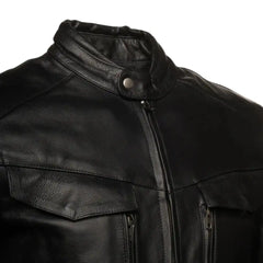 Close-up of the heavy-duty cowhide leather on the Huxley Top, highlighting the durable grain and reinforced double-stitching at the seams.