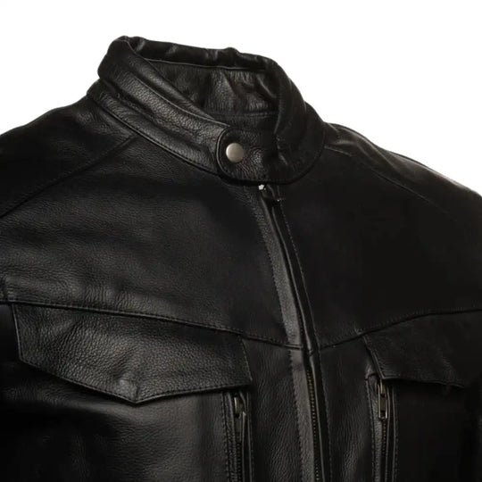 Close-up of the heavy-duty cowhide leather on the Huxley Top, highlighting the durable grain and reinforced double-stitching at the seams.