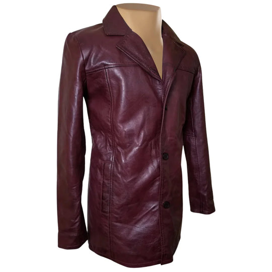 Side profile of Krueger's maroon leather blazer highlighting the slim-cut sleeves, structured shoulders, and the depth of the flap pockets.