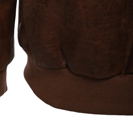 Close-up of the ribbed waistband on the Laurent Vintage Brown A2 Bomber Jacket, emphasizing the classic bomber jacket style.