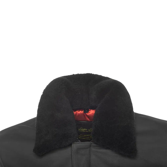 Close-up of the shirt collar of a matte black A2 bomber leather jacket.