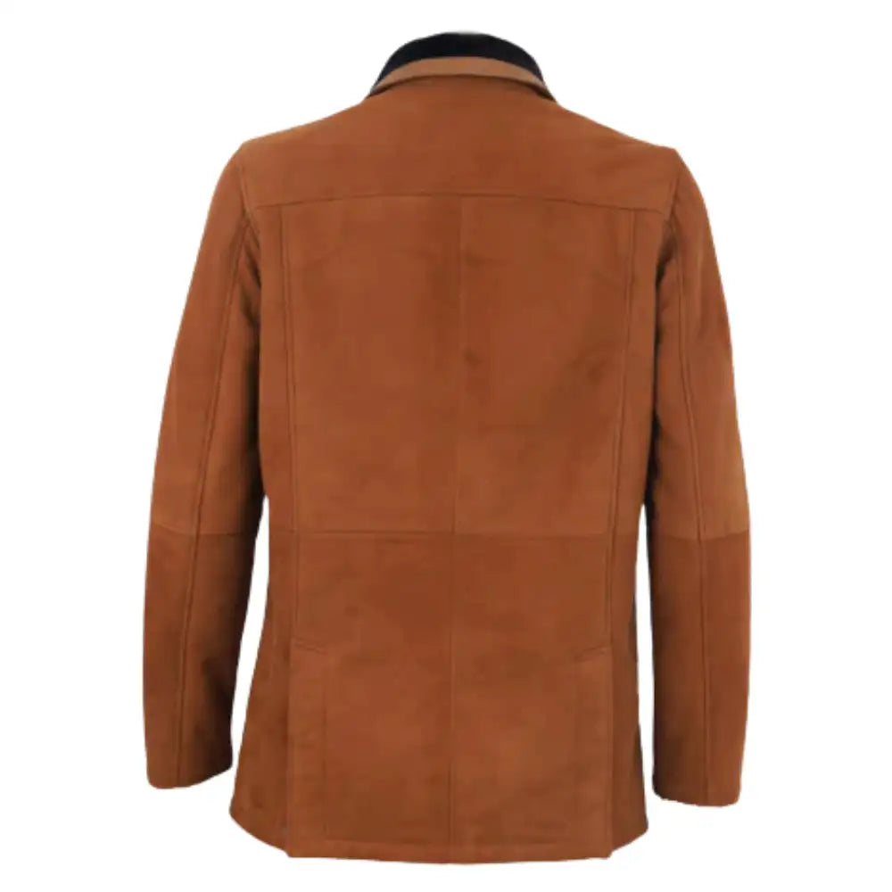 Rear view of tan suede buttoned up coat with black collar on a white background.