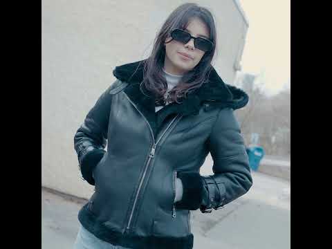 Sofie's black biker style sheepskin shearling jacket with hoodie