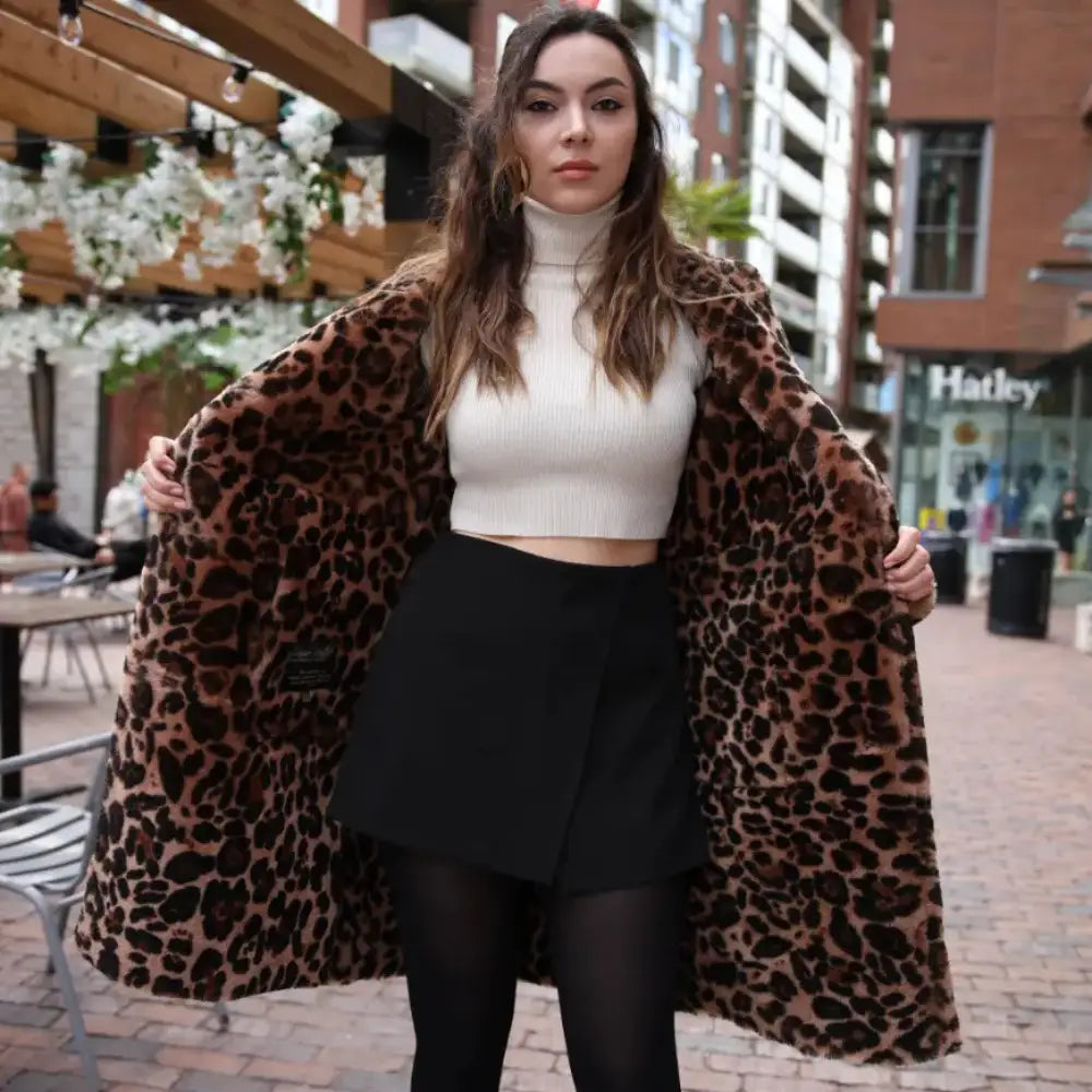 Model wearing Seraphina Leopard Print Oversized Double Breasted Shearling Leather Coat leopard print coat
