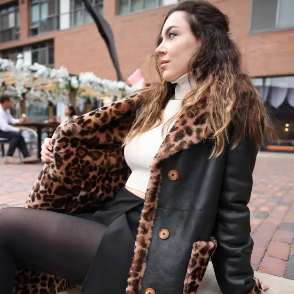 Model side view wearing Seraphina Leopard Print Oversized Double Breasted Shearling Leather Coat long coat profile