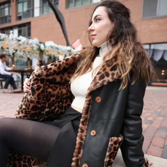 Model side view wearing Seraphina Leopard Print Oversized Double Breasted Shearling Leather Coat long coat profile