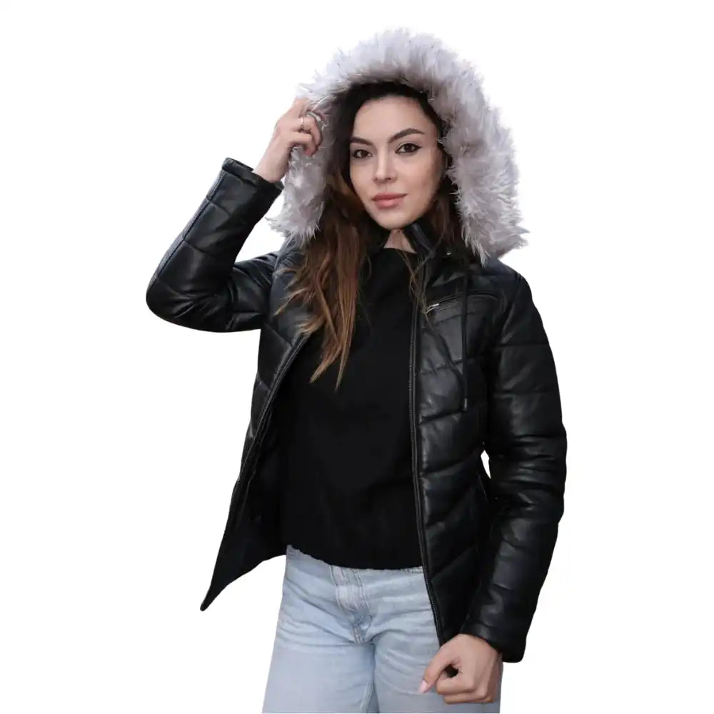 Detailed view of the heavy-duty front zipper and storm flap, showing the reinforced stitching on the premium leather surface.