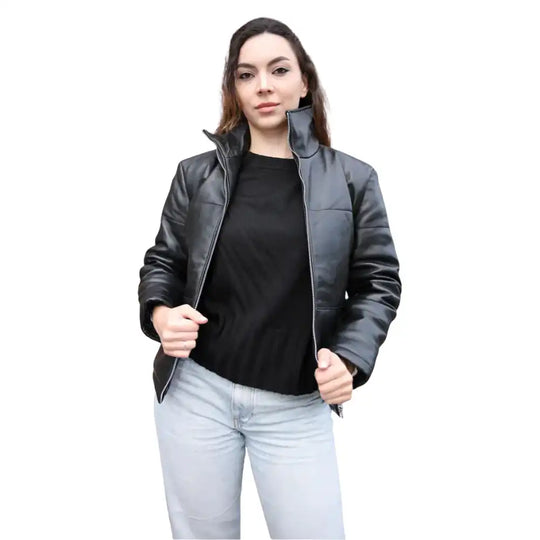 Woman wearing a black leather jacket over a black shirt on a white background