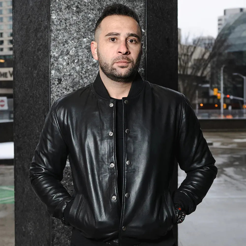 Model wearing Victor Black Varsity Leather Jacket casual varsity outfit