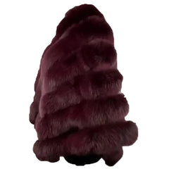 A detailed close-up of genuine burgundy fox fur, showcasing the soft texture, high-sheen hairs, and premium craftsmanship of the cape.