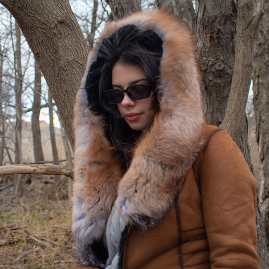 Chantal's Tan Shearling coat with large fox fur hoodie and trim