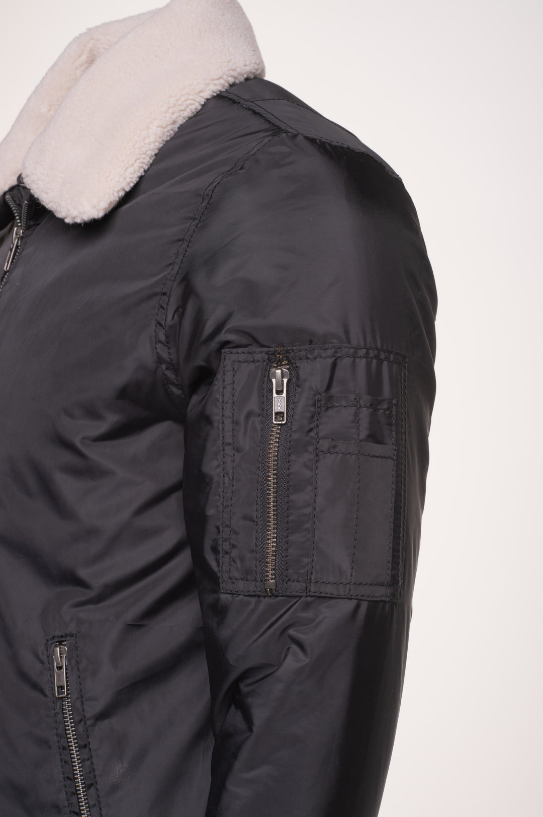 Black Riccardo's fur-collared nylon flight jacket